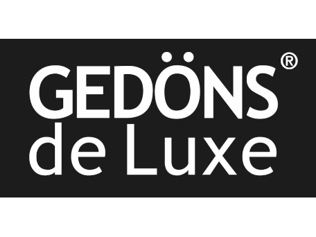 Logo von GEDÖNS de Luxe in weißer Schrift auf schwarzem Hintergrund.