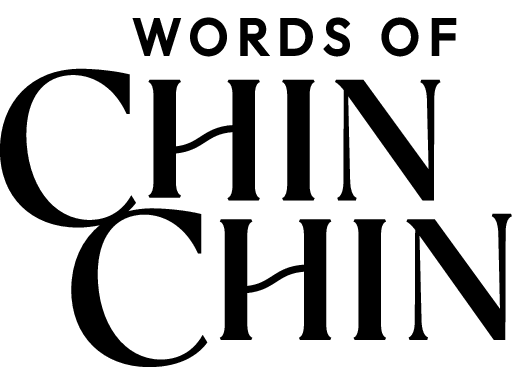 Schriftzug "Words of Chin Chin" in eleganter, schwarzer Schrift.